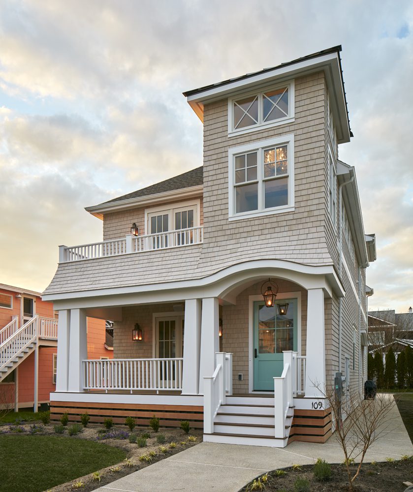 Exterior front of two story sea-side cottage.